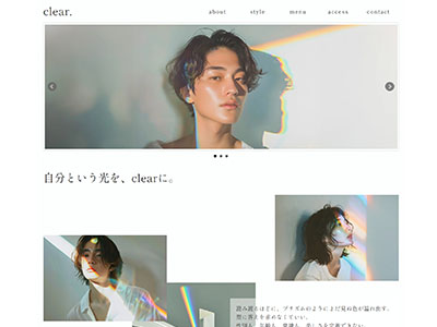 美容やスタイル提案を行う「clear」のウェブサイトトップページ画像。虹色の光に照らされたショートヘアの人物の写真と、キャッチコピー「自分という光を、clearに。」が目立つデザイン